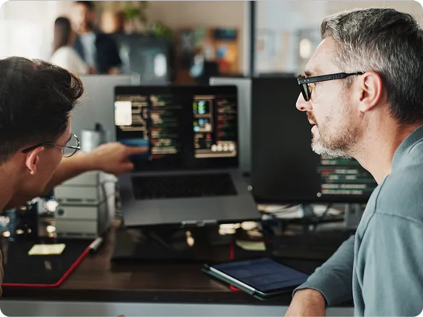 A team discussing Salesforce strategy in a meeting room